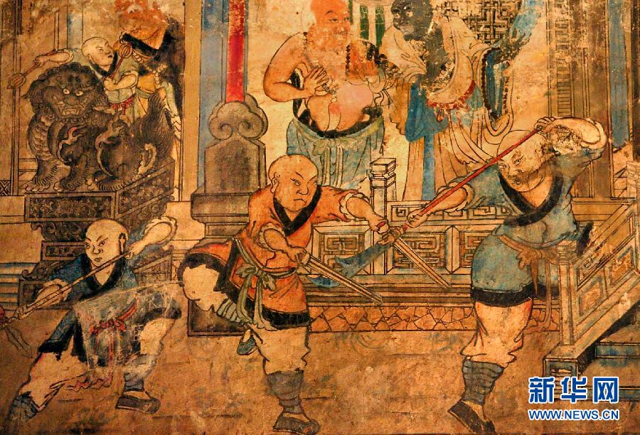 少林寺白衣殿內(nèi)的墻上表現(xiàn)少林武僧習(xí)武練拳的壁畫(局部,2005年9月15日攝)。
