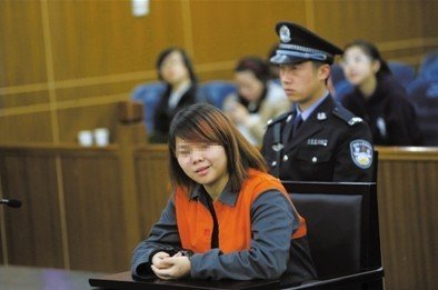 2013年4月3日，被告人小萍在法庭上受審。新京報記者 王貴彬 攝