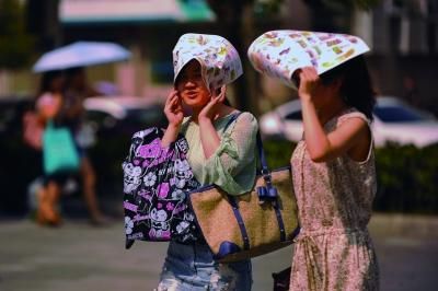 進(jìn)入7月份以來，南京出現(xiàn)了多個高溫天氣。本報資料圖片 劉瀏 攝