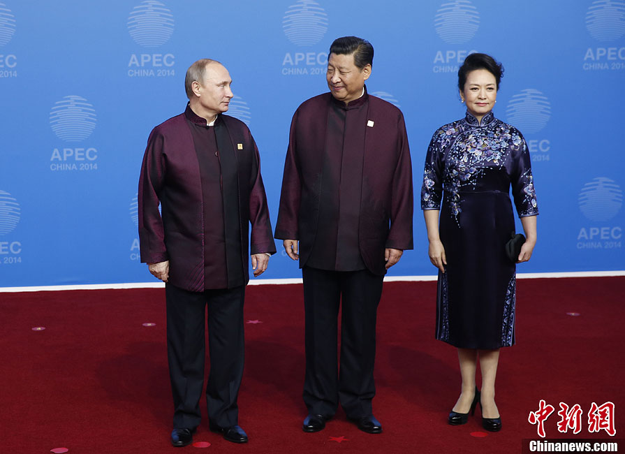 圖為習(xí)近平夫婦歡迎俄羅斯總統(tǒng)普京。中新社發(fā) 杜洋 攝